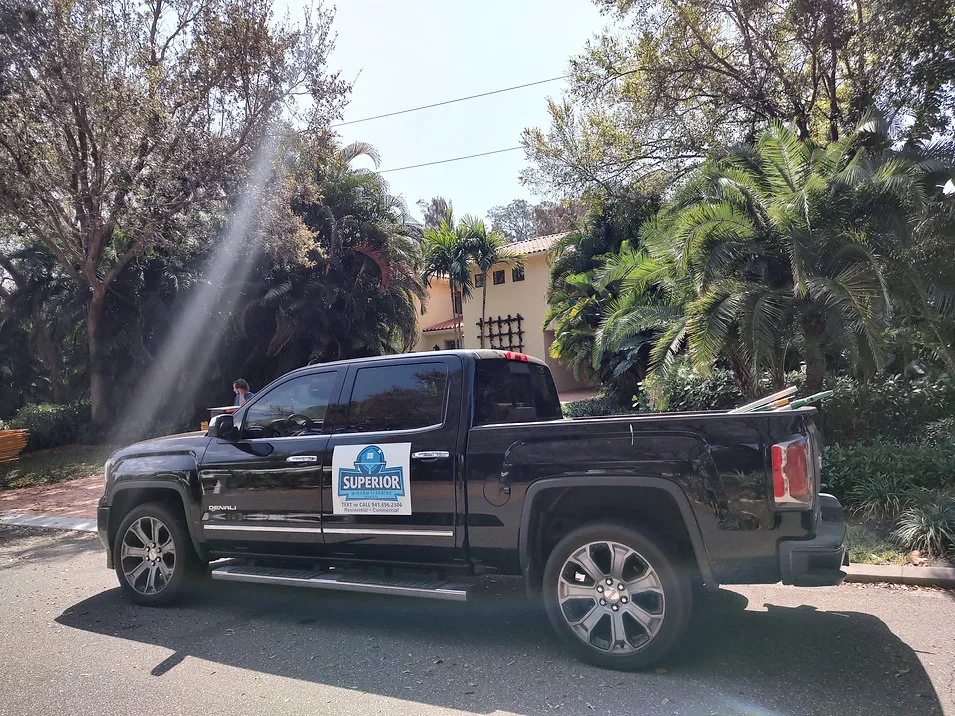 Superior Window Cleaning’s truck at a Sarasota property